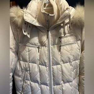 Italian down filled jacket with fox fur hood.